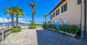 Apartamentos de lujo en una villa histórica en el lago Maggiore.